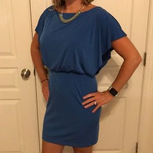 Jessica Simpson exposed back royal blue dress.